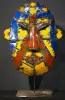 Product image 1 of the product “Small Mask on stand - Model 1, 50cm height, sculpture from upcyceled oil barrel ”