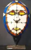 Product image 1 of the product “Small Mask on stand - Model 2, 50cm height, sculpture from upcyceled oil barrel ”