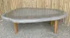 Product image 1 of the product “table made of riverstone with wooden feet. size approx. 129x84x38 cm ”
