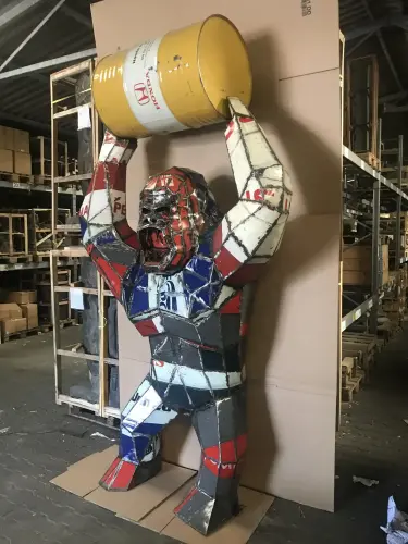 Product image of the product “Angry Gorilla with Barrel, 300cm height, sculpture from upcyceled oil barrel. ”