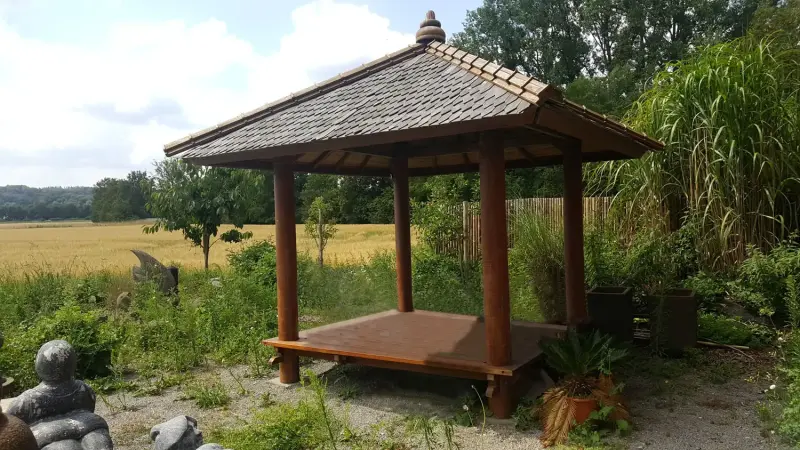 Product image 1 of the product “Exhibit - Gazebo garden house with artistic roofing ”