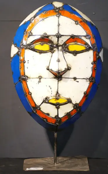 Product image 1 of the product “Small Mask on stand - Model 2, 50cm height, sculpture from upcyceled oil barrel ”