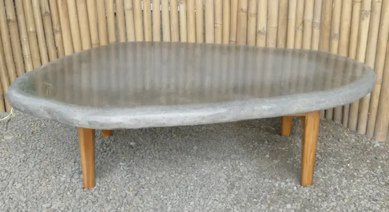Product image 1 of the product “table made of riverstone with wooden feet. size approx. 129x84x38 cm ”