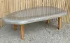 Product image 2 of the product “table made of riverstone with wooden feet. size approx. 129x84x38 cm ”