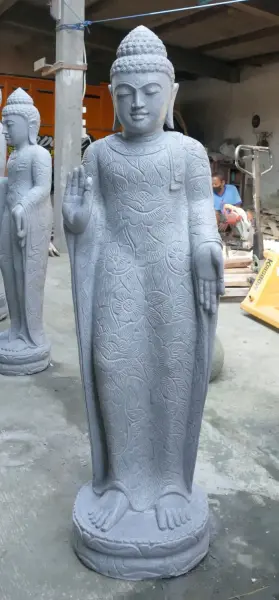 Product image 2 of the product “Standing Buddha with floral carving, Abudaya position. 44 x 31 x 154cm. Natural stone (river stone), stonemasonry ”