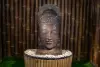 Product image 3 of the product “Khmer-Head (070cm) as water feature with different top. 46 x 36 x 85cm. Stone cast, handcrafted & coloured ”